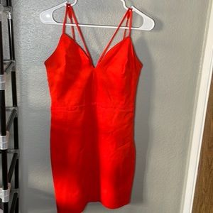 Bebe dress. Size medium. Color: red/orange